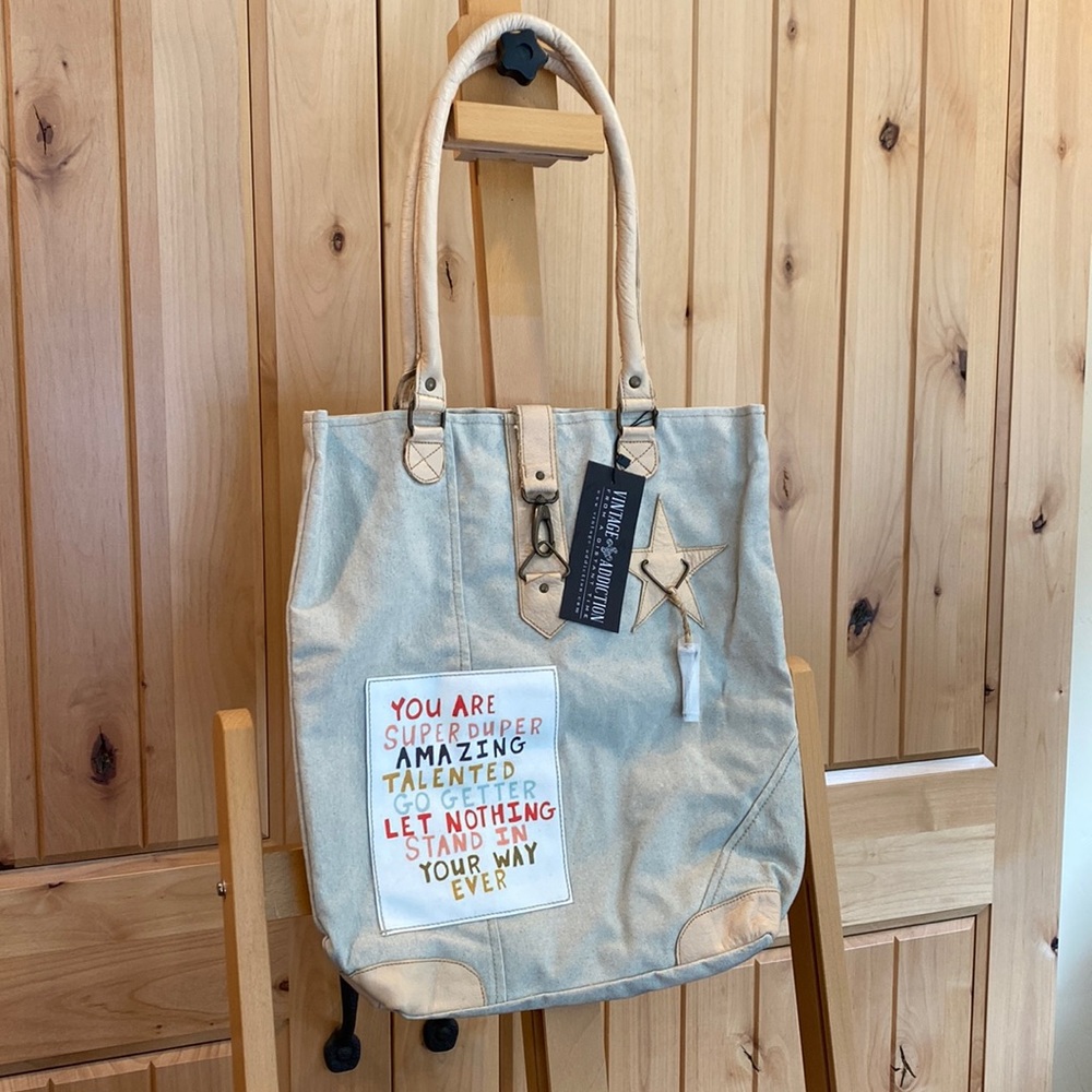 Vintage Addiction canvas and leather tote. New with tags.